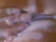 Filthy slut fingers poon and ass while masturbating